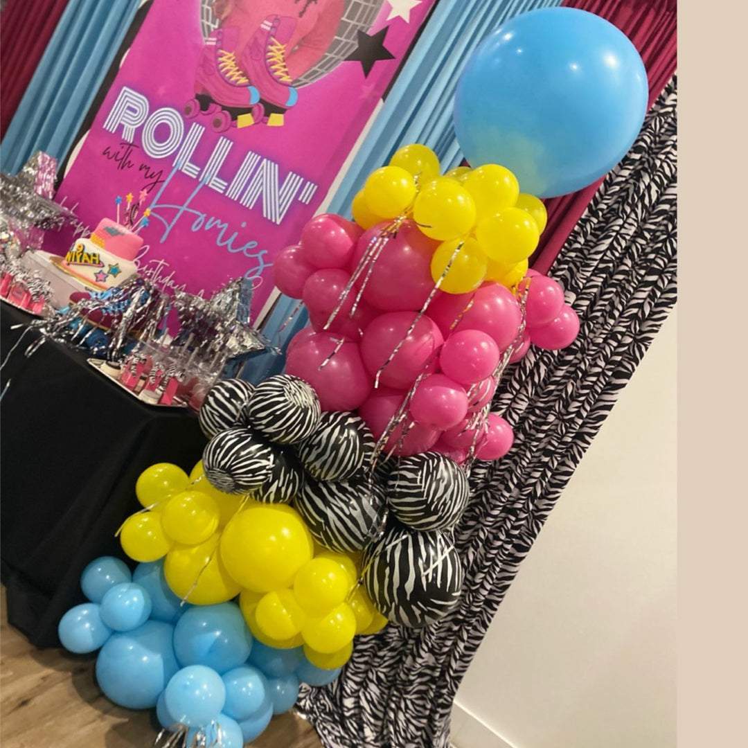 balloon-decor-column-with-yellow-pink-blue-and-zebra-print-balloons-for-weddings-kid-paties-hampton-raods-va-blissful-journeys