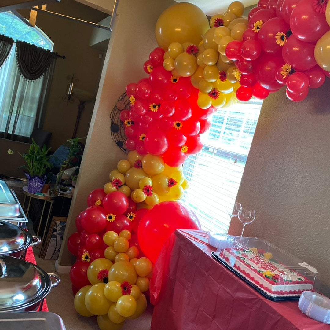 red-yelloww-balloon-garland-with-sunflowers-for-weddings-parties-special-occassions-blissful-journeys