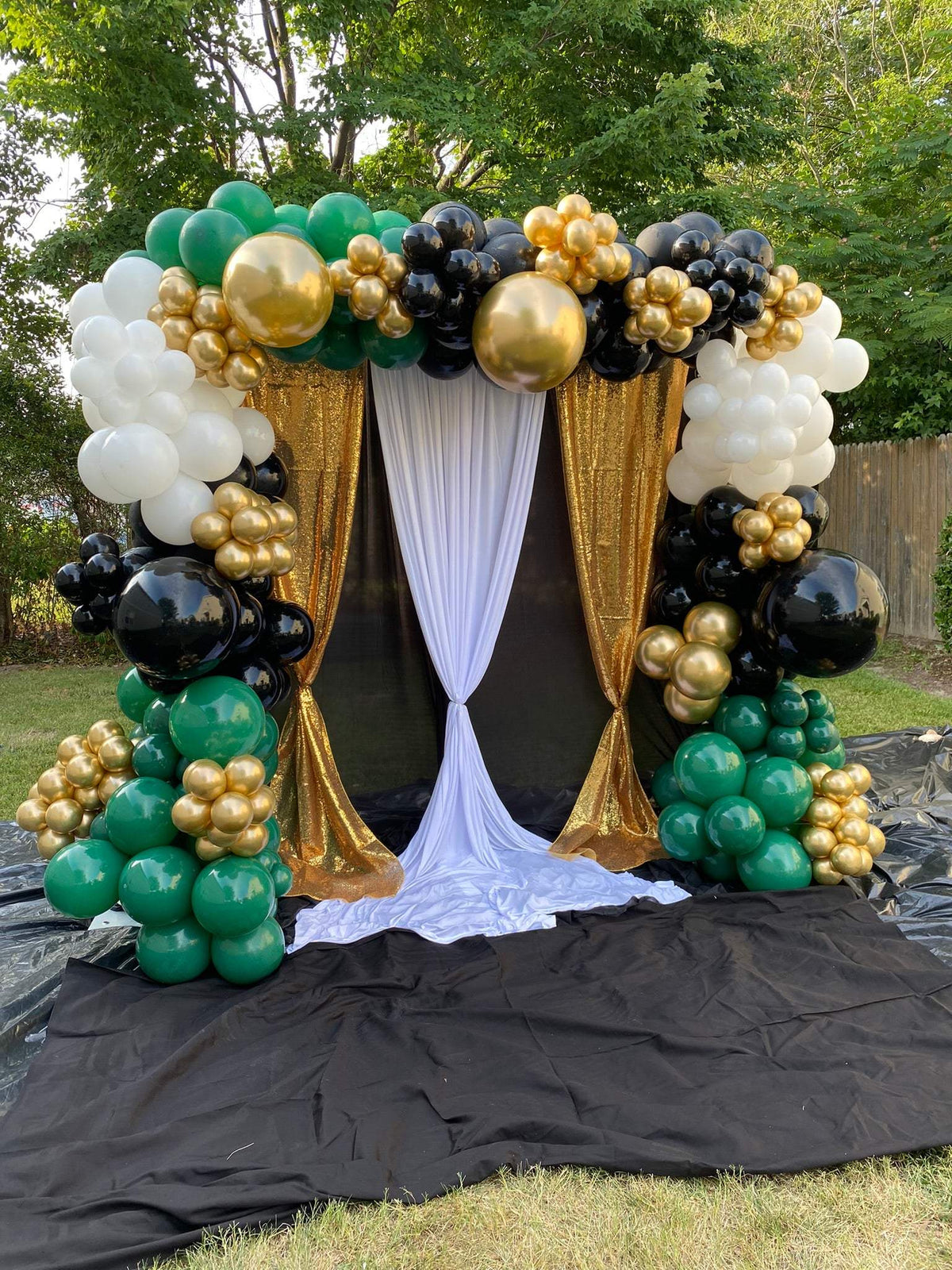 Gold,Green and Black Balloon Arch with Curtain Backdrop-Blissful Journeys -arch,arches,backdrop,Balloon arches,birthday parties,black,gold backdrop,green,weddings,white